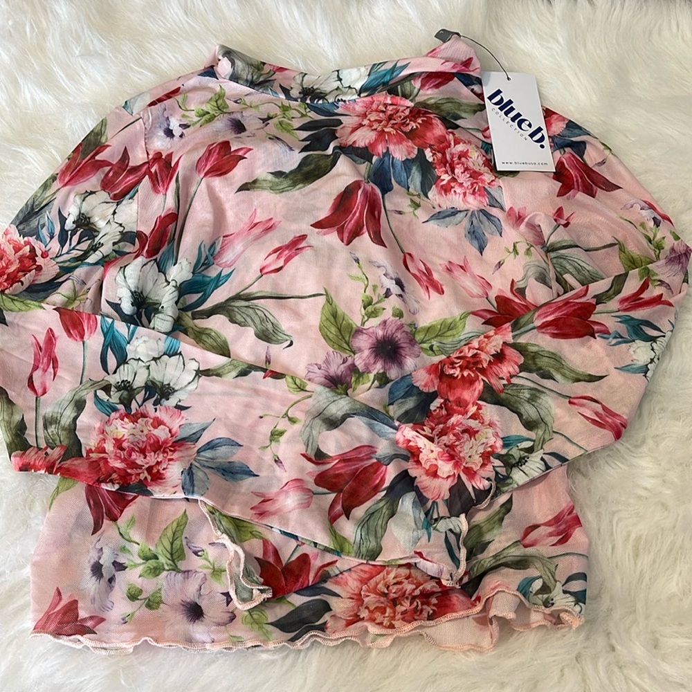 size large floral mesh . Button back neckline brand new !! Size large